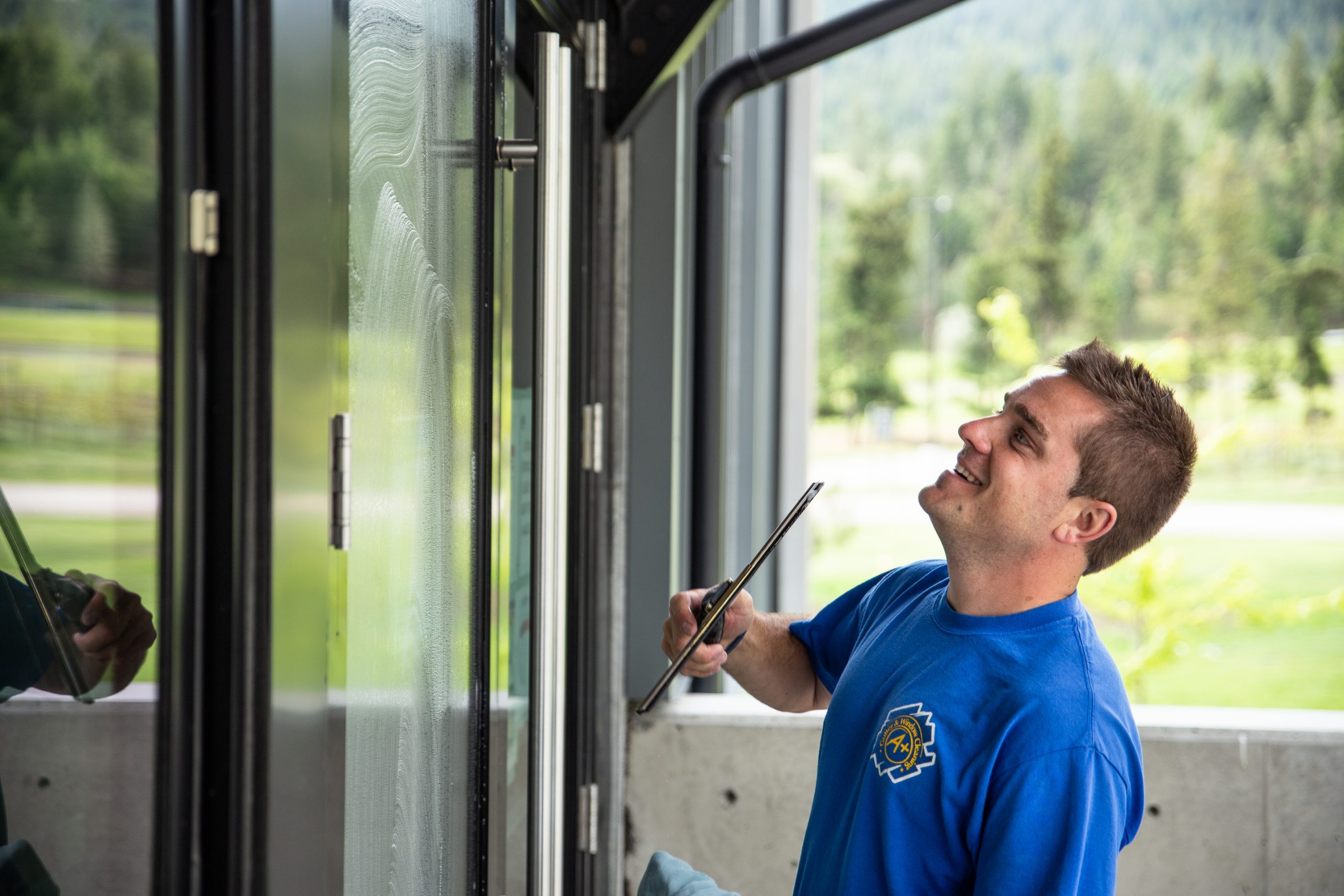 Tanner Cleaning Winery Windows